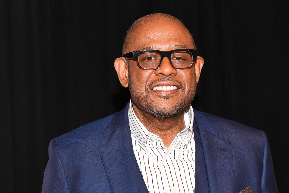 Forest Whitaker in black brimmed glasses