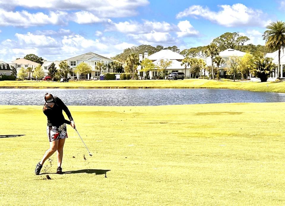 Amelia Lewis of Jacksonville hits a punch shot onto the 10th green during the final round of the Epson Tour's Atlantic Beach Classic on March 23 at the Atlantic Beach Country Club.