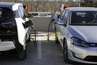 BMW i3 and Volkswagen e-Golf electric cars using Combined Charging System (CCS) DC fast charging