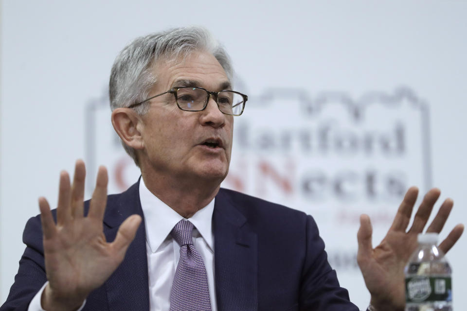 Federal Reserve Board Chair Jerome Powell addresses a round table discussion during a visit to Silver Lane Elementary School, in East Hartford, Conn., Monday, Nov. 25, 2019. Powell and Federal Reserve Bank of Boston President Eric Rosengren toured a working-class neighborhood in East Hartford and met with residents to get a closer look at their challenges. (AP Photo/Steven Senne)