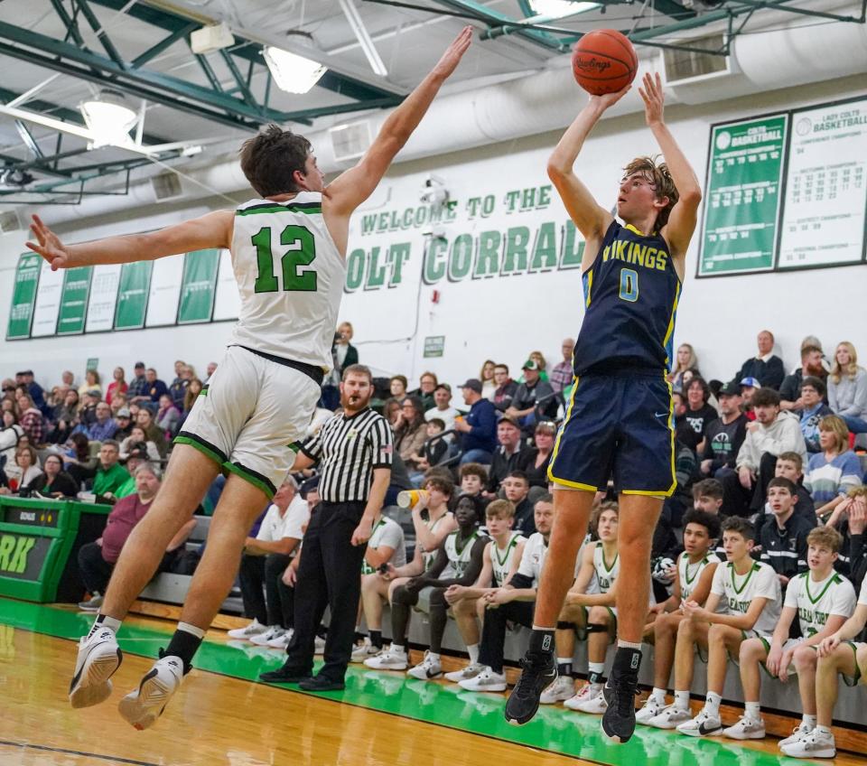 River Valley's Carson Smith shoots a jump shot at Clear Fork earlier this season. Smith became River Valley's second all-time leading scorer in boys basketball history earlier this year.