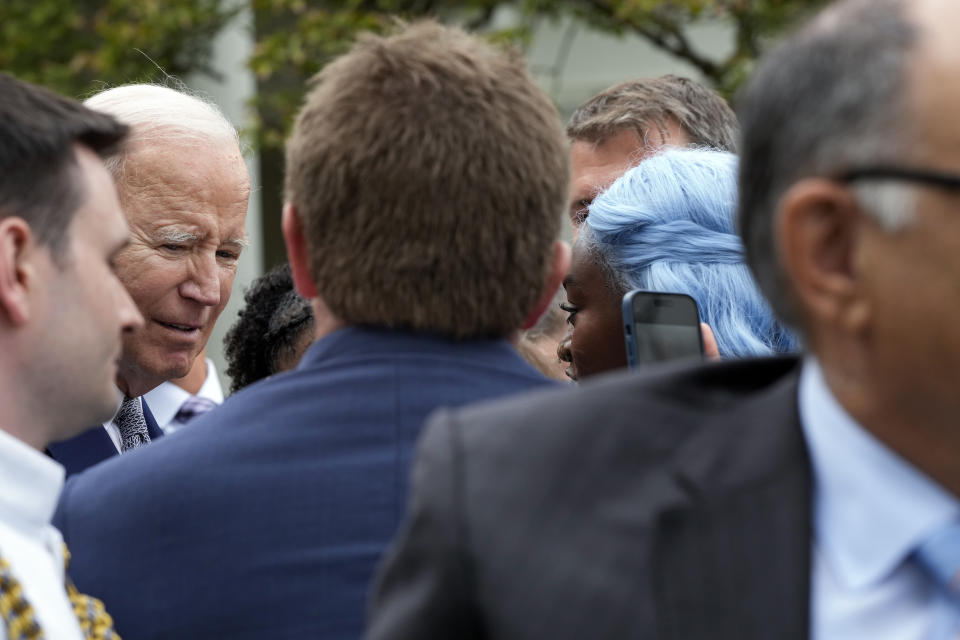 President Joe Biden greets people in the audience after speaking about gun safety on Friday, Sept. 22, 2023, from the Rose Garden of the White House in Washington. (AP Photo/Jacquelyn Martin)