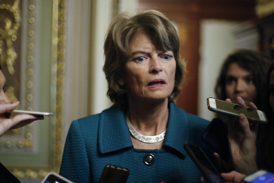 FILE - In this Oct. 4, 2018 file photo, Sen. Lisa Murkowski, R-Alaska, speaks to members of the media on Capitol Hill in Washington. The fight over President Donald Trump’s border wall is heading to the GOP-controlled U.S. Senate, putting Republicans in the uncomfortable spot of deciding whether to back his declaration of a national emergency. (AP Photo/Pablo Martinez Monsivais)