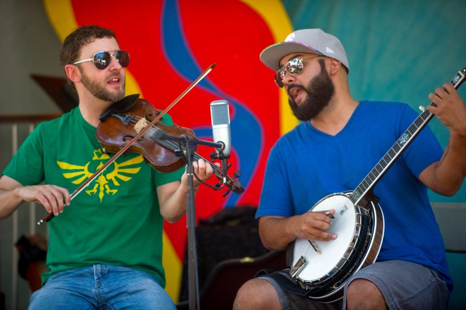 Shane Kalbach, left, and  Snap Jackson of Snap Jackson and the Knock On Wood Players perform at The Record's 18th annual Family Day in the Park at University Park in Stockton on Sept. 19. 2019.