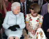 Though famed for not smiling Anna Wintour (R), couldn't help but grin when she sat next to the Queen at the designer Richard Quinn's runway show in February 2018. (Yui Mok/AFP)