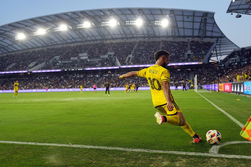 Jul 13, 2024; Los Angeles, California, USA; Columbus Crew forward Diego Rossi (10) kicks from the corner in the first half against LAFC at BMO Stadium. Mandatory Credit: Kirby Lee-USA TODAY Sports