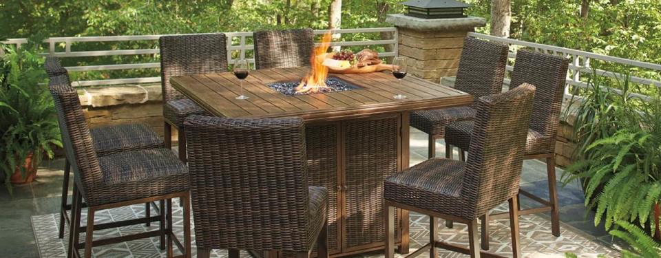 8 piece seating and table set on sale with fire pit from Ashley furniture 