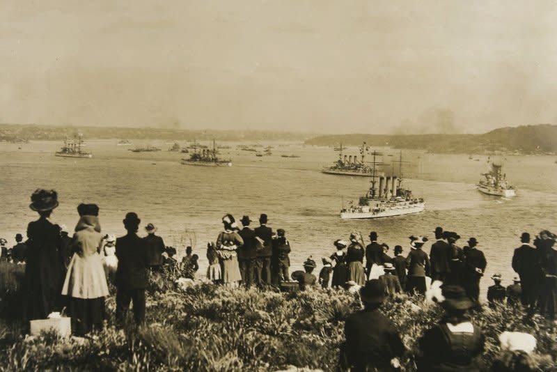 Spectators watching the arrival of the United States Navy's, "Great White Fleet," upon their arrival into Sydney Harbor in 1908. On December 16, 1907, the fleet set out on its year-long circumnavigation of the globe on the order of President Theodore Roosevelt. File Photo courtesy Australian National Maritime Museum/UPI