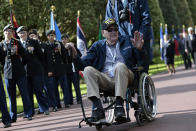 U.S. veteran Raymond Dawkins attends the 78th anniversary of D-Day ceremony, in the Normandy American Cemetery and Memorial of Colleville-sur-Mer, overlooking Omaha Beach, Monday, June, 6, 2022. The ceremonies pay tribute to the nearly 160,000 troops from Britain, the U.S., Canada and elsewhere who landed on French beaches on June 6, 1944, to restore freedom to Europe after Nazi occupation. (AP Photo/ Jeremias Gonzalez)