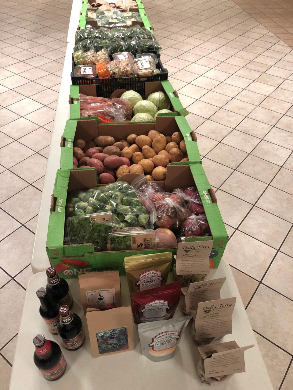 Boxes of produce at Farm Fresh Express.