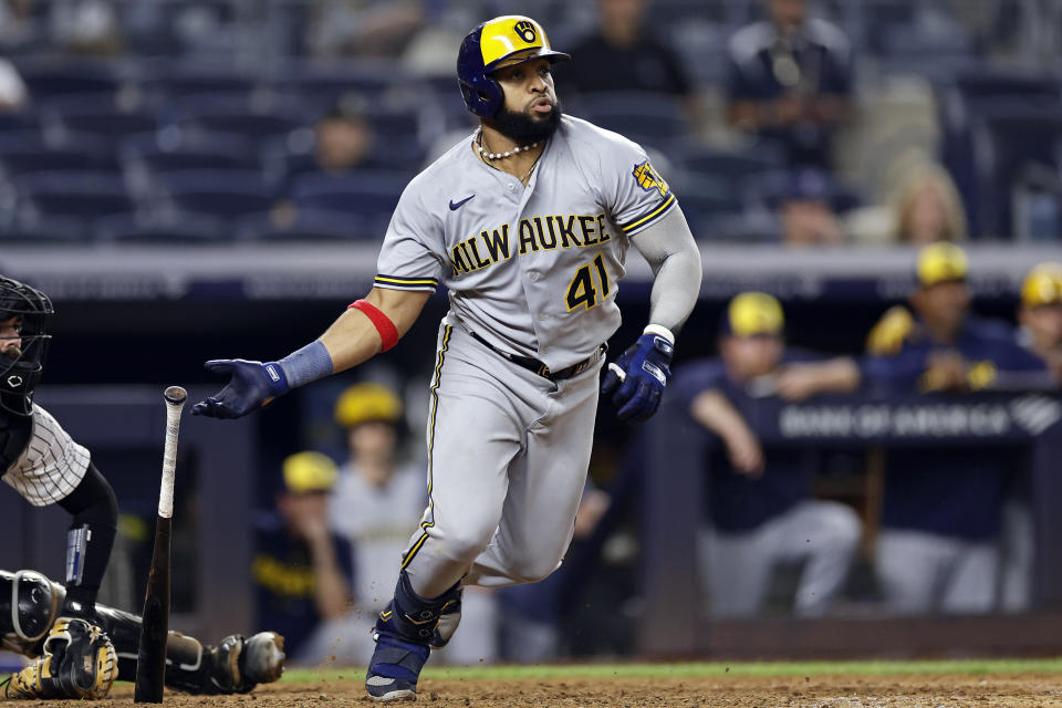 Milwaukee Brewers' Carlos Santana watches his RBI single against the New York Yankees during the eighth inning of a baseball game Friday, Sept. 8, 2023, in New York. (AP Photo/Adam Hunger)