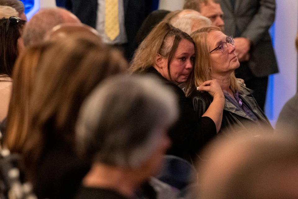 Steven Robin’s wife Amy reacts during the funeral of Bay St. Louis police officers Sgt. Steven Robin and Branden Estorffe at the Bay St. Louis Community Center in Bay St. Louis on Wednesday, Dec. 21, 2022. Robin and Estorffe were killed responding to a call at a Motel 6 on Dec. 14.
