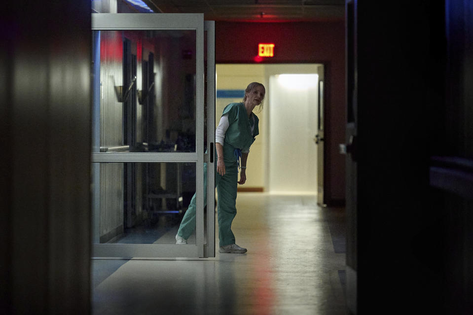 This image released by Netflix shows Jessica Chastain in a scene from "The Good Nurse." (JoJo Whilden/Netflix via AP)