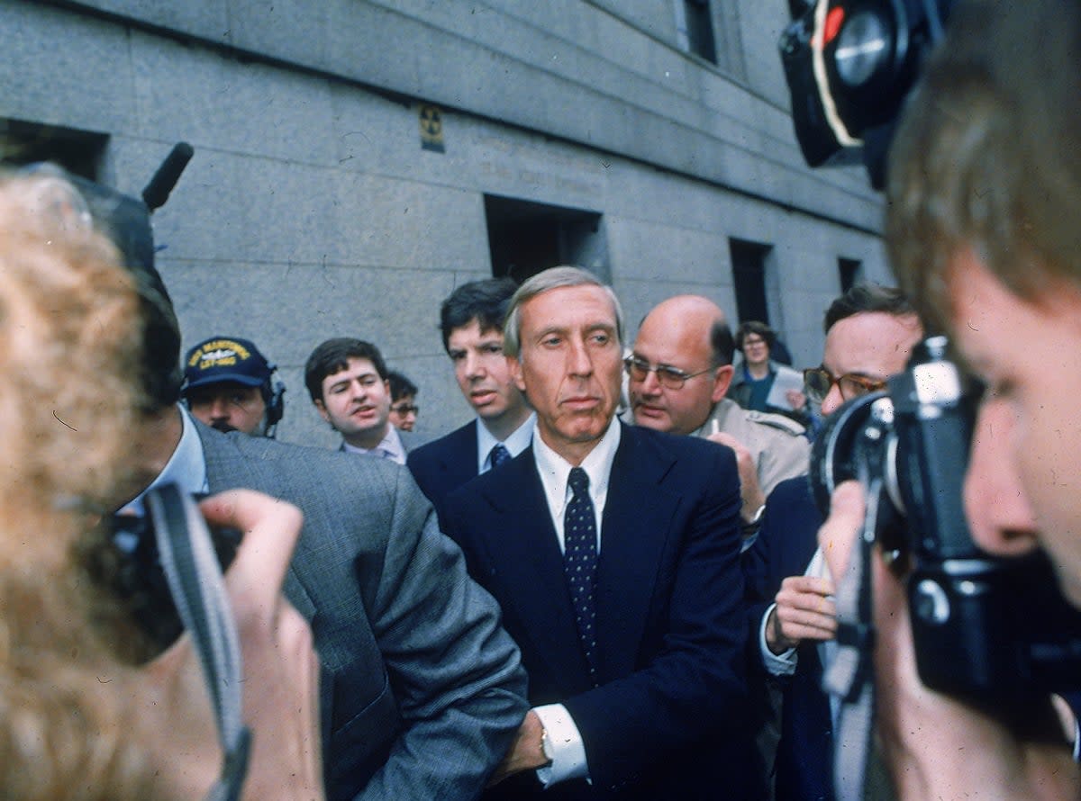 Ivan F. Boesky, center, leaves federal court in New York, April 24, 1987 after pleading guilty to one count of violating federal securities laws. Boesky died on 20 May, 2024, aged 87.  (1987 AP)