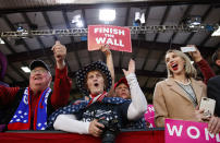 People in the audience cheer as President Donald Trump speaks at a campaign rally at Minuteman Aviation Hangar, Thursday, Oct. 18, 2018, in Missoula, Mont. (AP Photo/Carolyn Kaster)