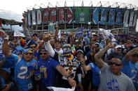 FILE - Fans cheer before an NFL football game between the Los Angeles Chargers and the Kansas City Chiefs, Monday, Nov. 18, 2019, in Mexico City. The NFL returns to Mexico City on Monday, Nov. 21, 2022, when Arizona Cardinals play the San Francisco 49ers. (AP Photo/Rebecca Blackwell, File)
