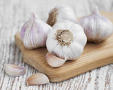 Place your unpeeled garlic cloves in a metal bowl. Take another metal bowl, and place the lips together to create a sphere. Then shake the whole thing like a cocktail shaker for 10 seconds. Watch Fast Ed's video to see this method in action.