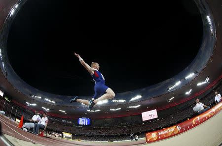 Britain's Greg Rutherford competes to win the men's long jump final during the 15th IAAF World Championships at the National Stadium in Beijing, China, August 25, 2015. REUTERS/Phil Noble