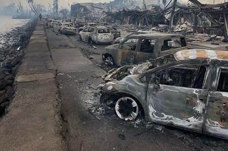 Burned out cars and the remains of buildings in Lahaina town in Maui, Hawaii, on Wednesday. The death toll from ongoing wildfires in Maui has climbed to 93. Photo courtesy of the Hawaii Wing Civil Air Patrol/EPA-EFE