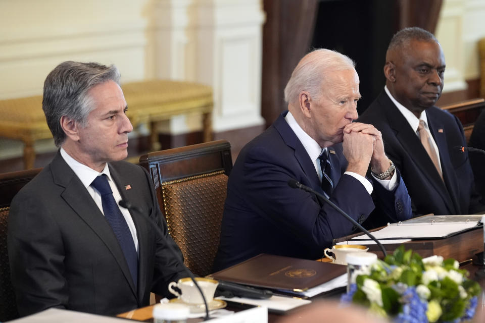 President Joe Biden listens with Secretary of State Antony Blinken and Defense Secretary Lloyd Austin as he meets with Polish President Andrzej Duda and Polish Prime Minister Donald Tusk in the East Room of the White House, Tuesday, March 12, 2024, in Washington. (AP Photo/Andrew Harnik)