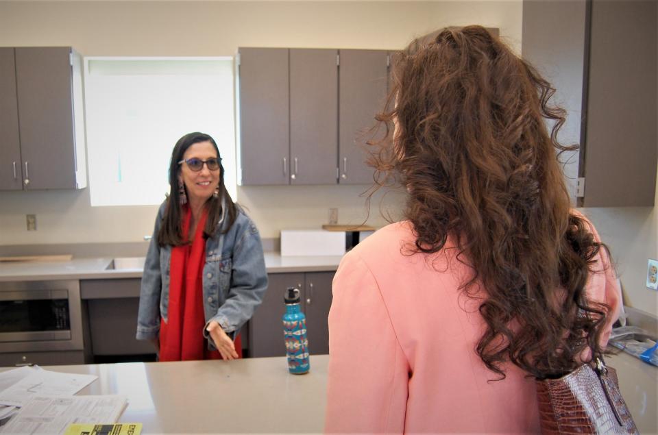 U.S. Rep. Teresa Leger Fernandez, left, and San Juan College President Toni Hopper Pendergrass check out one of the kitchens in the new student housing facility being built on the college campus in Farmington on May 5.