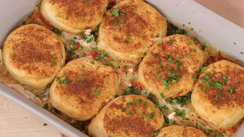 casserole with biscuit topping in white dish