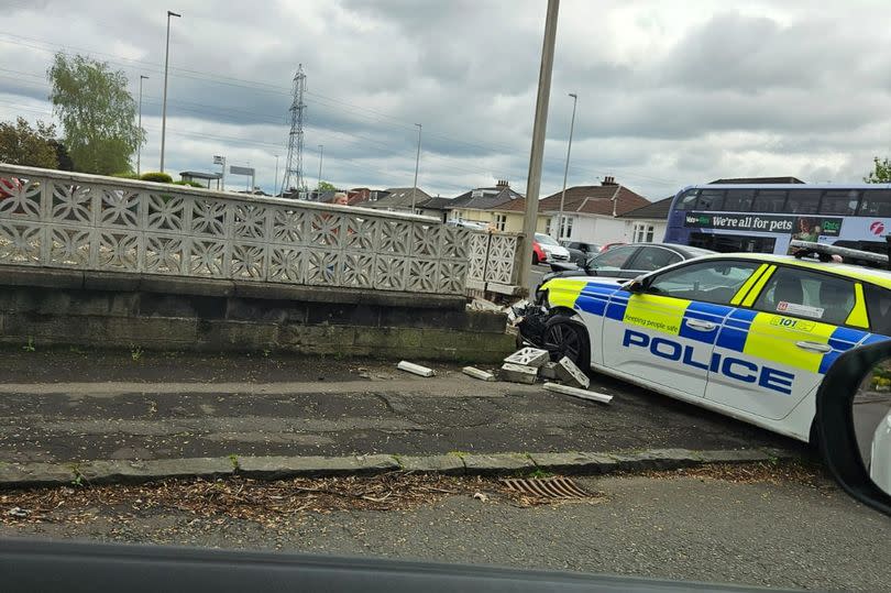 A police car crashed into a wall by Glasgow Road