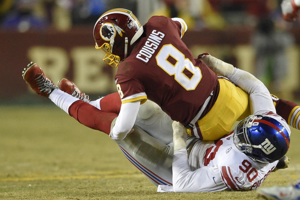 Jason Pierre-Paul had 8.5 sacks last season, including this one of Washington's Kirk Cousins. (AP) 