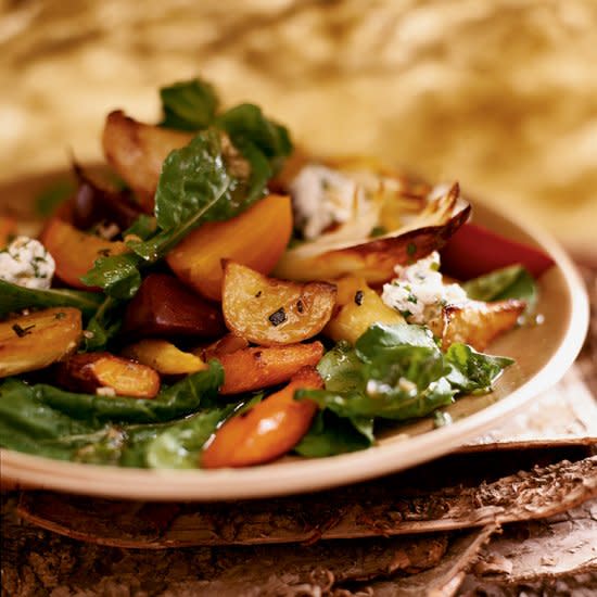 <p>Thanksgiving Make-Ahead Tip: The herbed goat cheese and the vinaigrette can be refrigerated overnight. The vegetables can be roasted earlier in the day and kept at room temperature.</p><p><a href="https://www.foodandwine.com/recipes/honey-roasted-root-vegetable-salad" rel="nofollow noopener" target="_blank" data-ylk="slk:GO TO RECIPE;elm:context_link;itc:0;sec:content-canvas" class="link ">GO TO RECIPE</a></p>