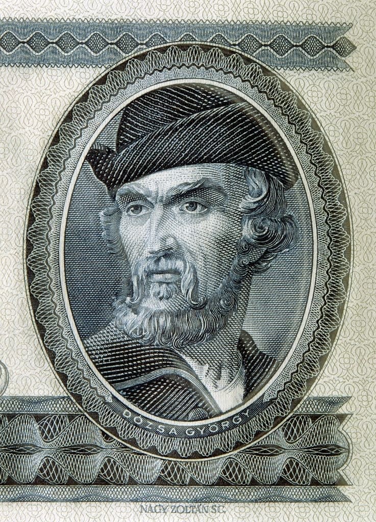 Portrait of György Dózsa, a Hungarian leader, depicted in intricate engraving with a serious expression and wearing a cap