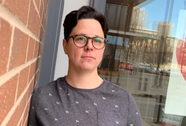 Dani Pohn, 38, was diagnosed with COVID-19 in June 2020 during an outbreak at the Verve Condominium in Calgary's East Village. She is now being treated at a post-COVID clinic for Calgarians with long-term respiratory problems.