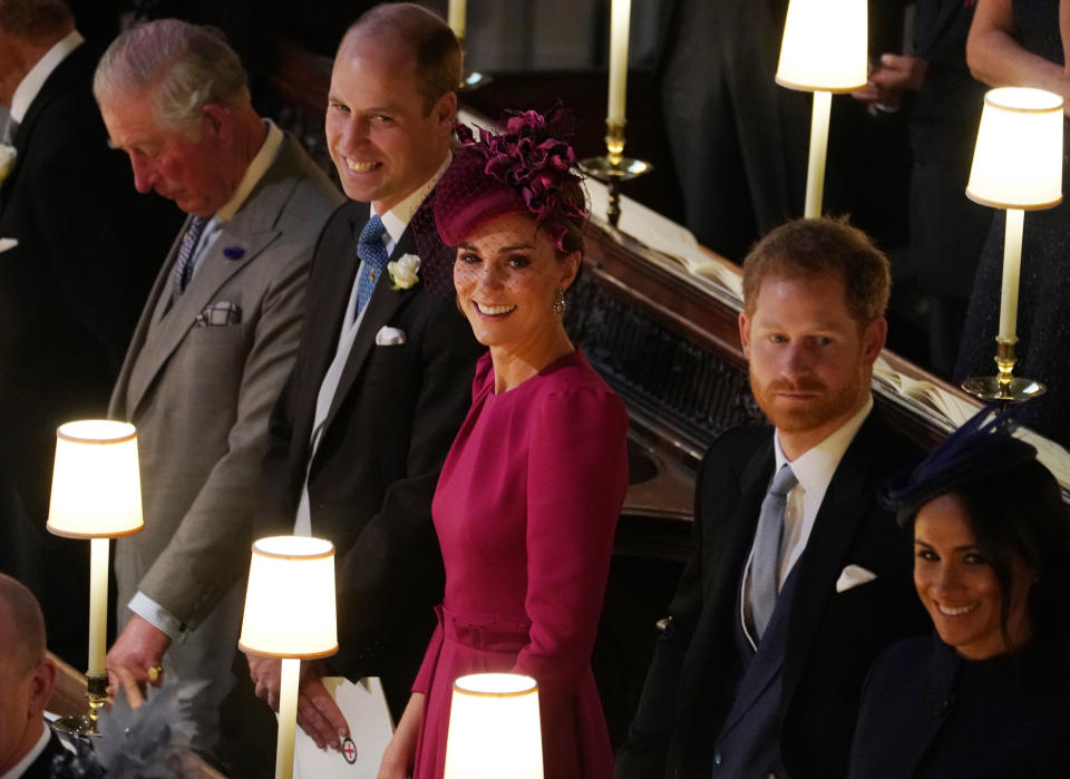 WINDSOR, ENGLAND - OCTOBER 12: Prince William, Duke of Cambridge Catherine, Duchess of Cambridge, Prince Harry, Duke of Sussex Meghan, Duchess of Sussex attend the wedding of Jack Brooksbank and Princess Eugenie of York at St. George's Chapel on October 12, 2018 in Windsor, England. (Photo by Owen Humphreys - WPA Pool/Getty Images)