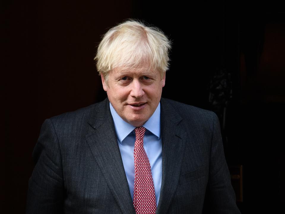 British Prime Minister Boris Johnson leaves Downing Street heading to 1922 committee meeting (Getty Images)