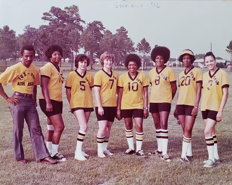 The Foxfire-Ponderosa Athletic Association, in addition to offering youth sports, included adult women's softball teams. Marshall Pitts Sr., left, coached a team that included his wife (No. 10), Carol W. Pitts.