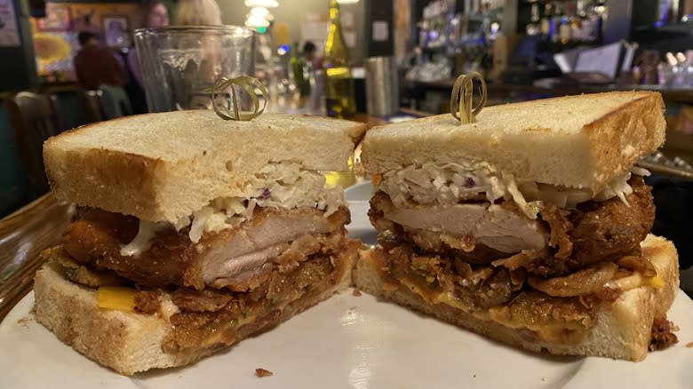 Halved fried chicken sandwich