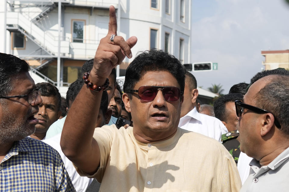 Opposition leader Sajith Premadasa gestures during a protest rally against high taxes and increases in electricity and fuel charges, in Colombo, Sri Lanka, Tuesday, Jan. 30, 2024. (AP Photo/Eranga Jayawardena)