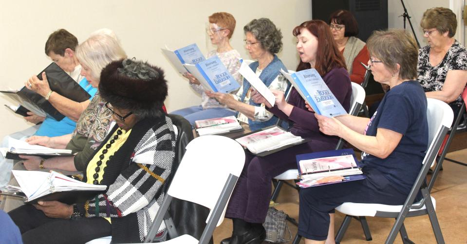 The soprano section of the Laurel Highlands Chorale prepares for the spring concert.