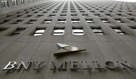 A BNY Mellon sign is seen on their headquarters in New York's financial district, January 19, 2011. REUTERS/Brendan McDermid