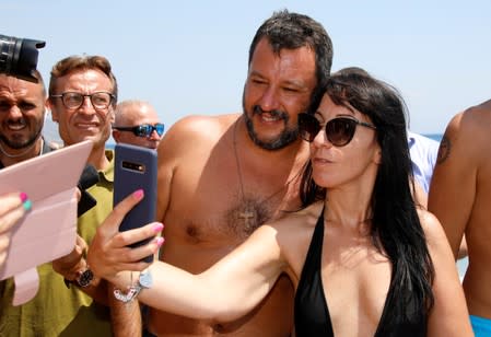 FILE PHOTO: Italian Interior Minister Salvini meets supporters at the beach in Taormina