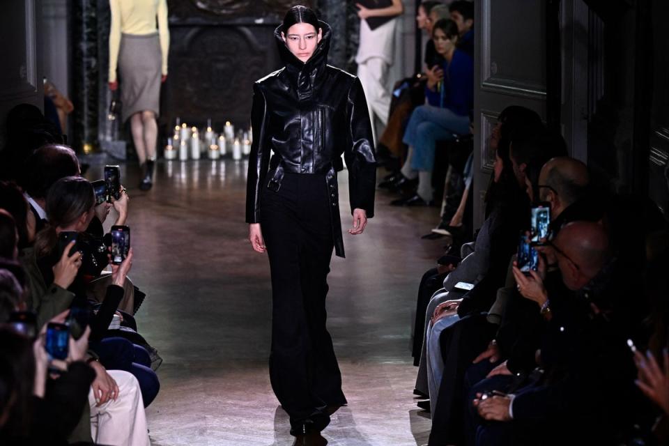 A model in a Victoria Beckham creation for her Paris Fashion Week show (AFP via Getty Images)