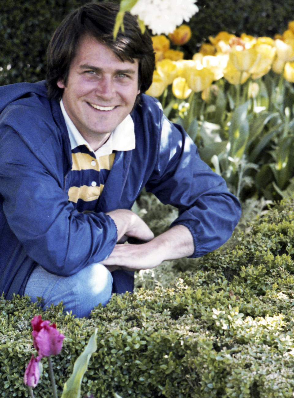 In this photo provided by the Jimmy Carter Presidential Library, Dale Haney poses for a photo at the White House on April 20, 1979. White House grounds superintendent Dale Haney has been a constant through the past 10 presidencies. As of this month, Haney has tended the lawns and gardens of the White House for 50 years. (Jimmy Carter Presidential Library via AP)