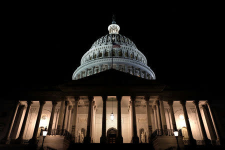 U.S. Capitol is seen shortly after beginning of the Government shutdown in Washington, U.S., January 20, 2018. REUTERS/Yuri Gripas