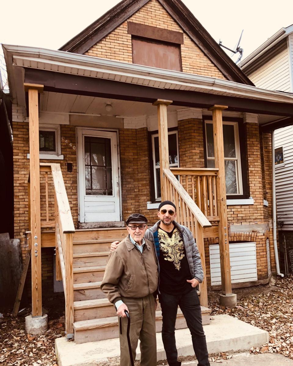 Rami Nashashibi, a MacArthur Foundation fellow, and grandfather Mohamed Daoud in 2019 in front of the house in Chicago where the Daouds immigrated to in 1952. Now, Nashashibi is founder and executive director of the Inner-City Muslim Action Network.
