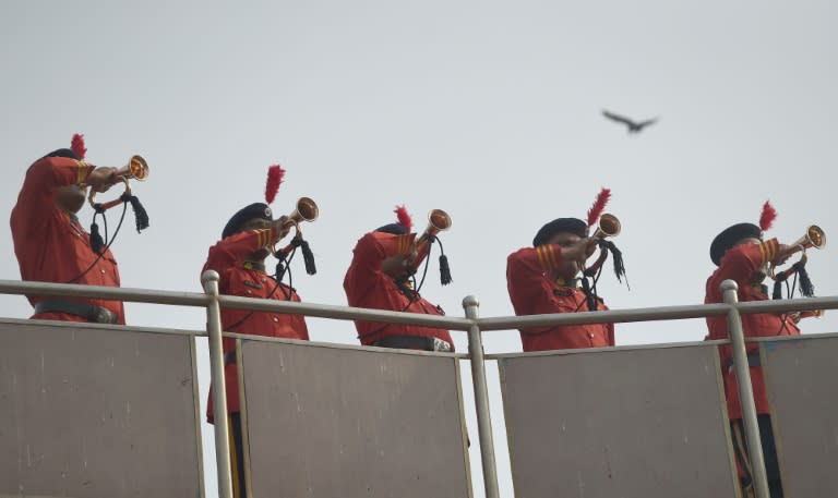 Mumbai police band members sounded bugles as part of the city's commemorations