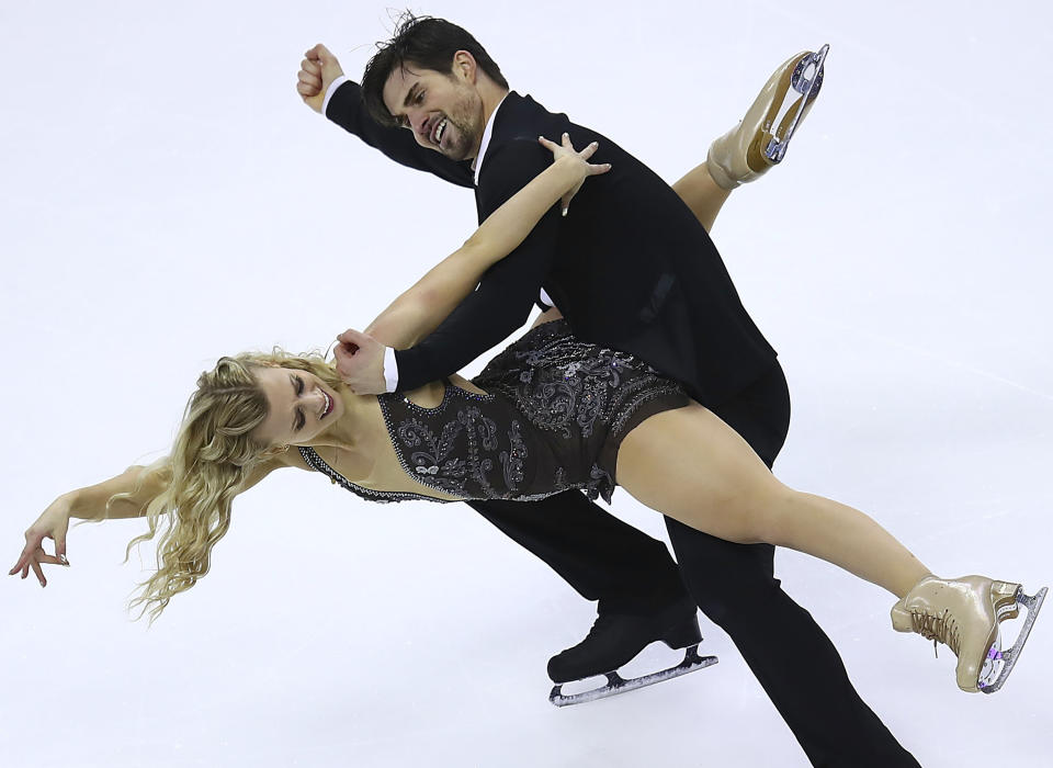 FILE - Madison Hubbell, left, and Zachary Donohue perform during the free dance event at the U.S. Figure Skating Championships in San Jose, Calif., Jan. 7, 2018. As U.S. skaters, led by three-time world champion Nathan Chen, two-time U.S. champion Alysa Liu, and outstanding ice dance couples Hubbell and Donohue, and Madison Chock and Evan Bates, prepare for nationals during the first week in Jan. 2022, in Nashville, they need to be aware of the pressure ahead. (AP Photo/Ben Margot, File)