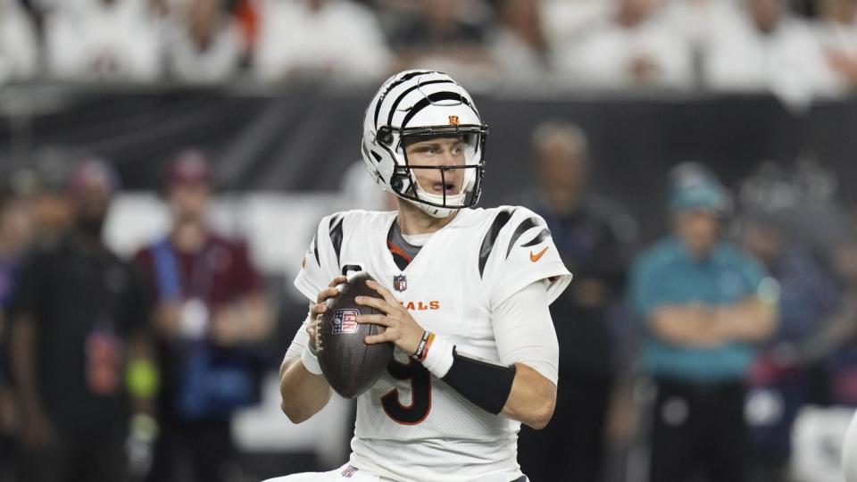 Cincinnati Bengals quarterback Joe Burrow throws against the Rams during a game.