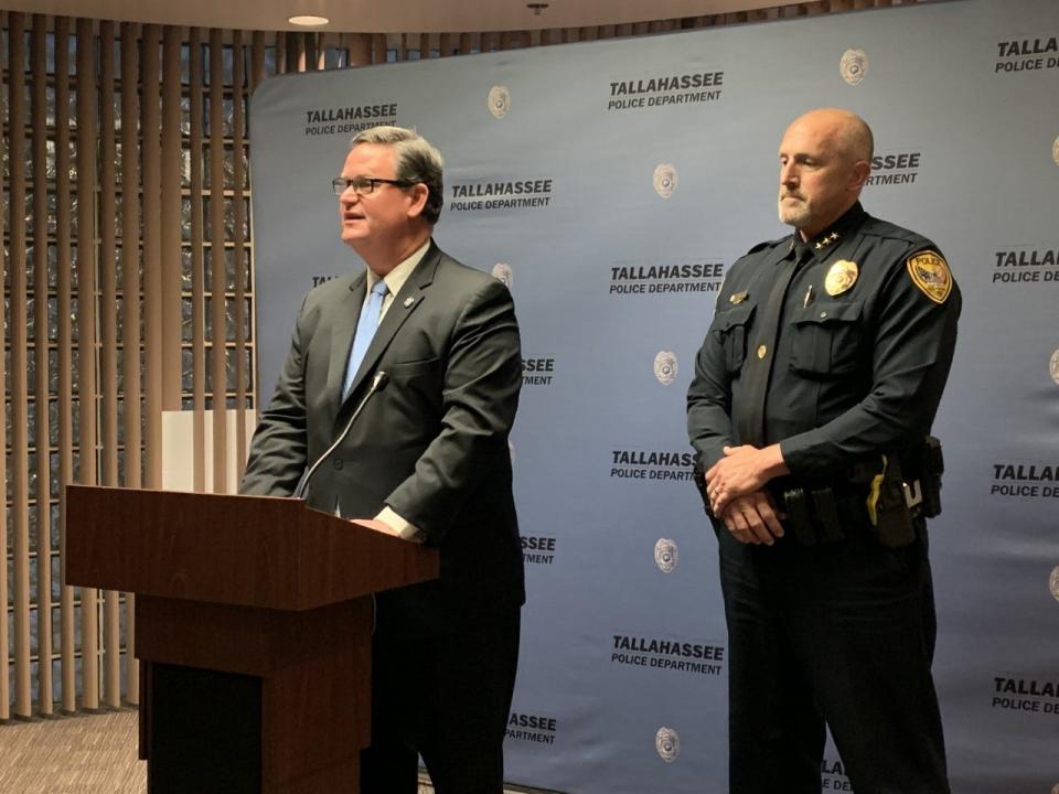 Mayor John Dailey, left, and Tallahassee Police Department Deputy Chief Jason Laursen, right, speak about the death of an on-duty TPD officer early Wednesday, June 8, 2022.