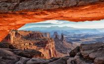 <p>The largest national park in Utah, <a href="https://www.nps.gov/cany/index.htm" rel="nofollow noopener" target="_blank" data-ylk="slk:Canyonlands;elm:context_link;itc:0;sec:content-canvas" class="link ">Canyonlands</a>’s famous scenery is just as the name suggests: acres and acres of beautifully carved canyons. Whether you’re walking through the towering “Needles”, or staring across the Island in the Sky (a giant flat-topped mesa with gorgeous, panoramic views); you’re sure to never be bored of the Colorado River’s famous carvings. </p>