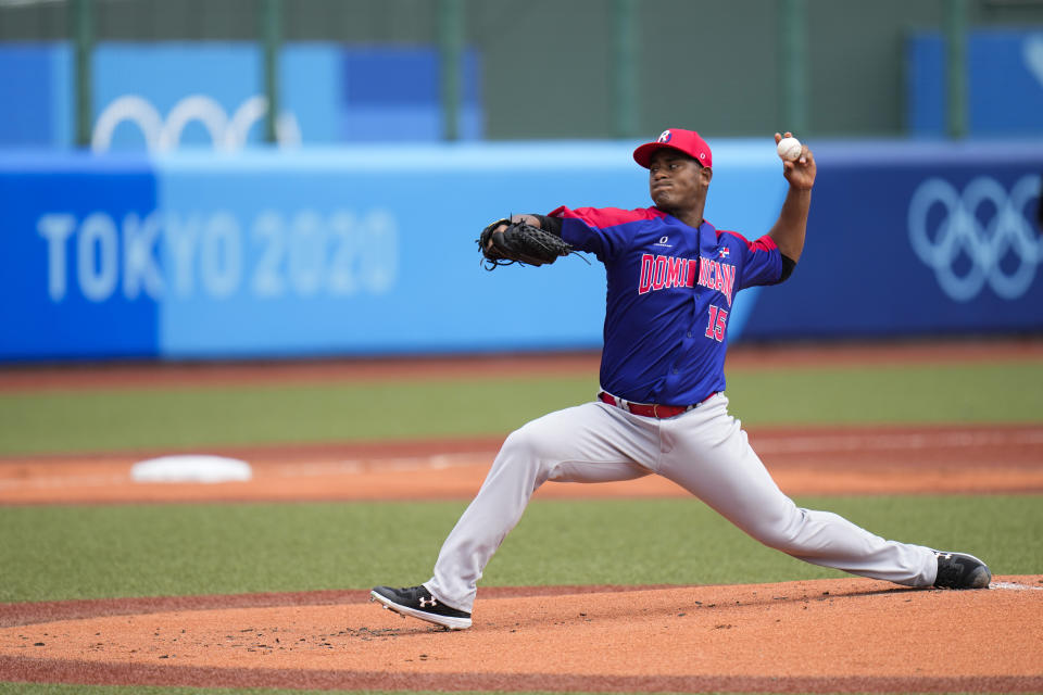 Dominican Republic starting pitcher Cristopher Mercedes throws against Japan during the first inning of a baseball game at the 2020 Summer Olympics, Wednesday, July 28, 2021, in Fukushima, Japan. (AP Photo/Jae C. Hong)