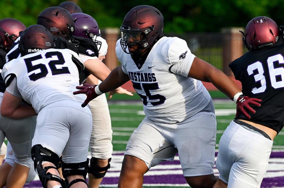Lipscomb Academy offensive lineman Chauncey Gooden, (55) blocks during a spring scrimmage Friday, May 12, 2023, in Nashville, Tenn. 